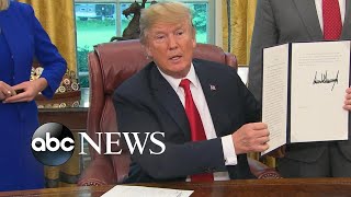 President Trump signs executive order he says will keep immigrant families together