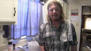 Red O'Hearn cooks beaver and nutria that he harvested