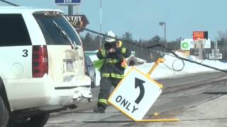 Two car accident knocks out power pole and traffic light