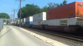 BNSF 6624 leads stack trailer train with SantaFe Warbonnet 4th-in-consist