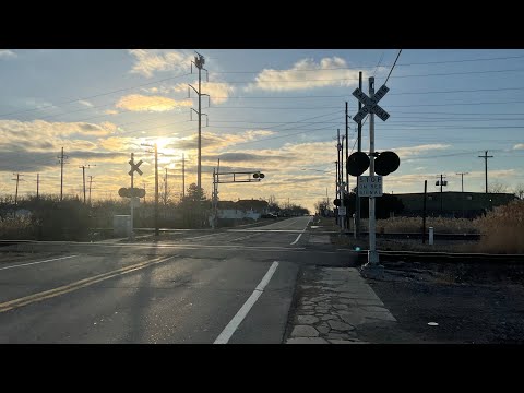 CN 3210 leads Southbound at sibley road railroad crossing ft, @313Railfan
