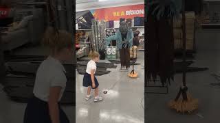 Girl's Startled Reaction to Halloween Decor