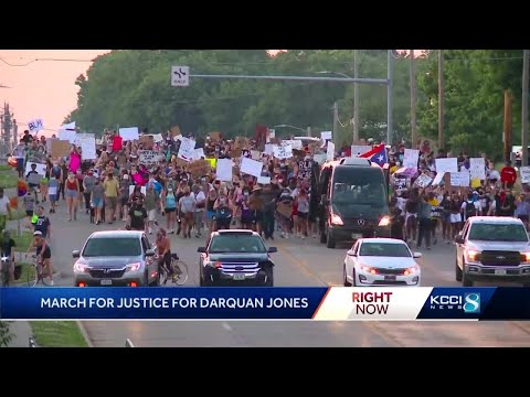 Protesters march through