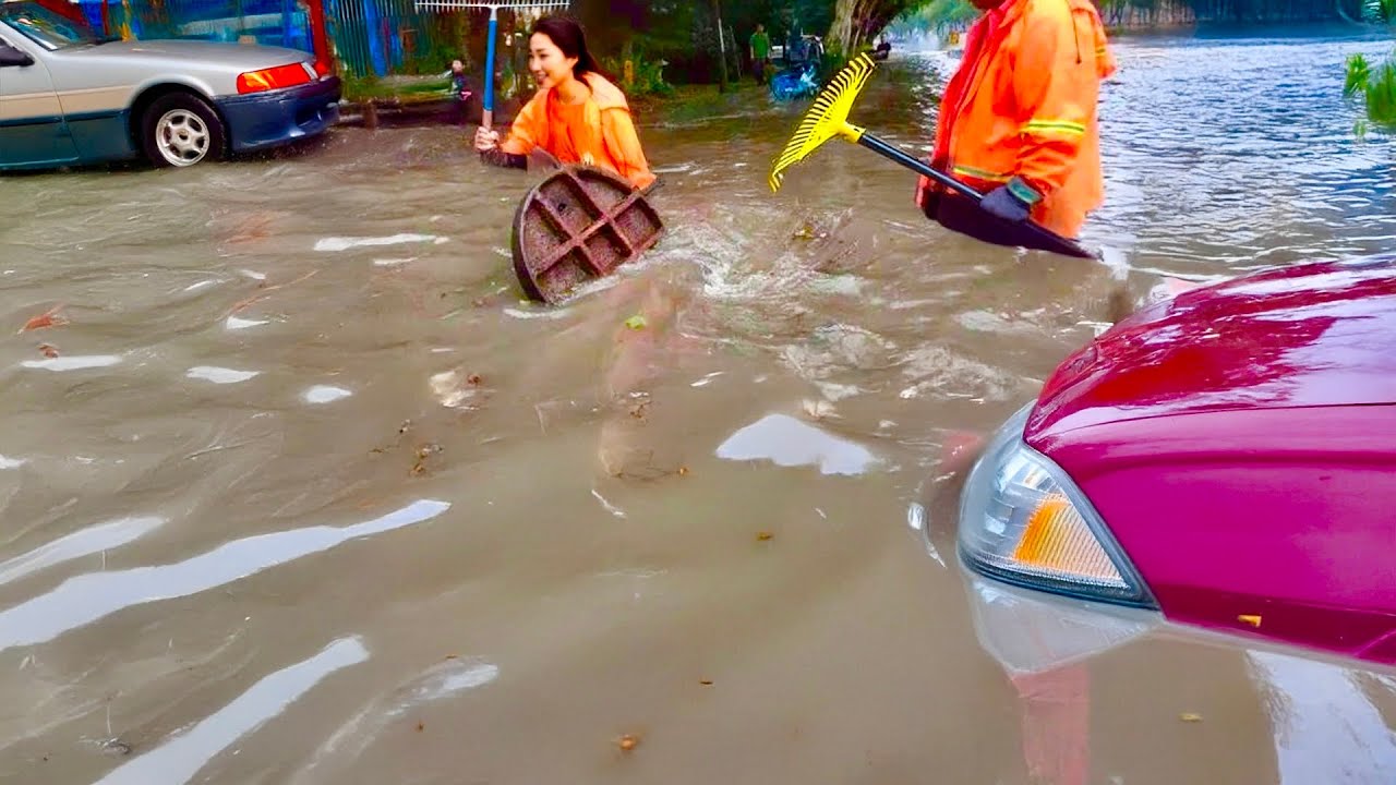Mastering the Flood Unclogging a Street After a Heavy Downpour - YouTube