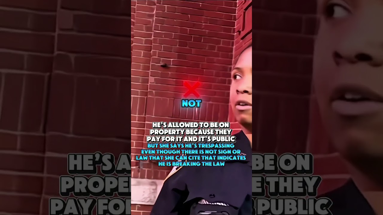 She is trying to stop him from recording lawfully on public property 