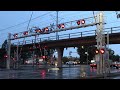 Railroad crossings with double overhead cantilevers towers on one side compilation 4k