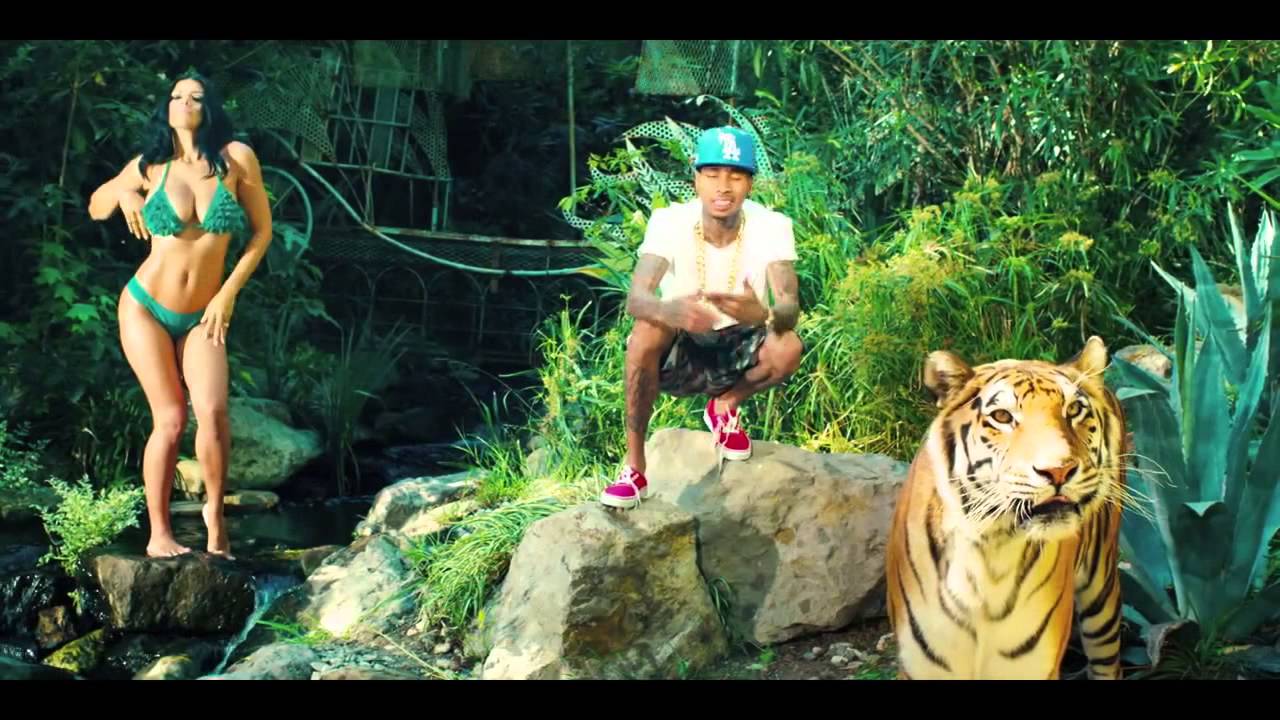 Негритянка в джунглях. Девушка в джунглях. Tyga тигр. Красивая женщина в джунглях. Клип девушка в джунглях.