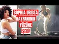 Capture de la vidéo Brass Against Adlı Müzik Grubunun Solisti Sophia Urista Sahnede Hayranının Yüzüne Idrarını Yaptı!
