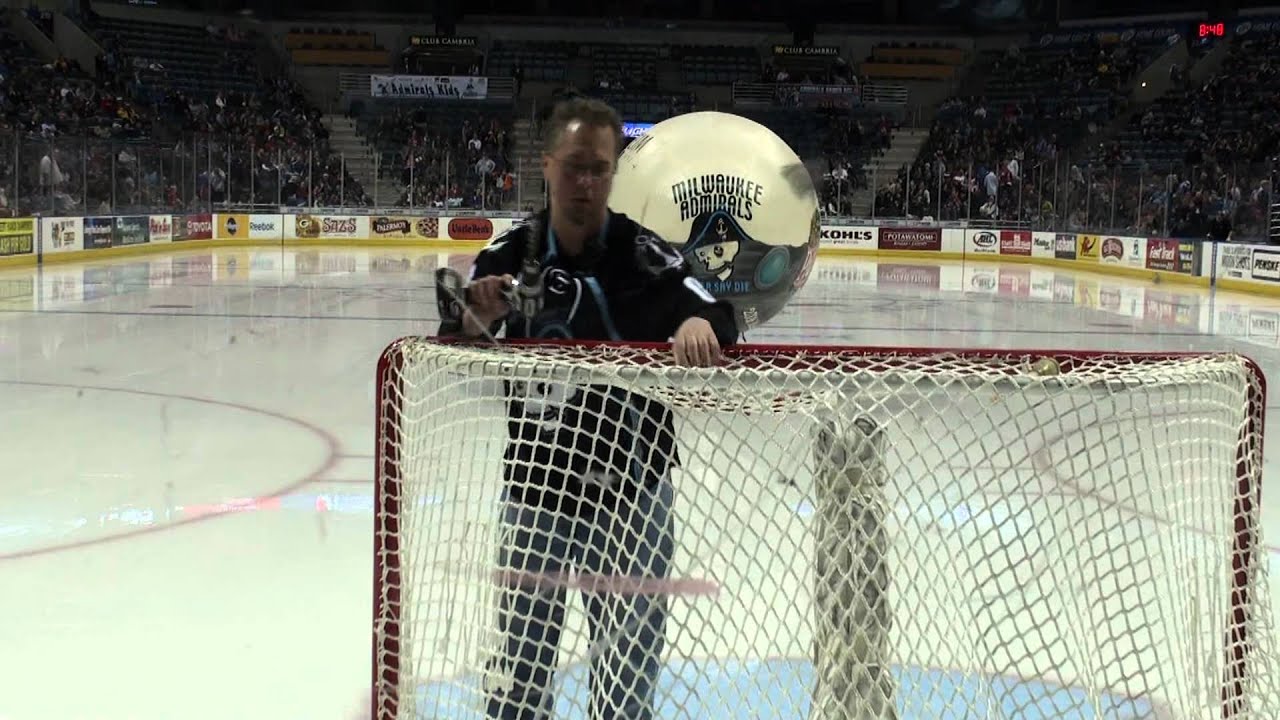 Scott Fisher Flies this 15 ft RC Blimp into the Goal Monkey at the Milwaukee Admirals game