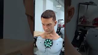A humanoid robot mimics human facial expressions and movements with #shorts