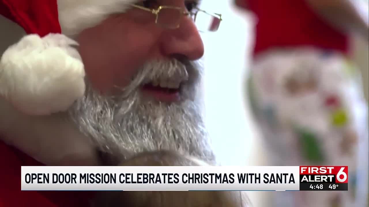 Santa stops by Open Door Mission in Omaha
