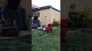 Kid jumps ramp in toy car
