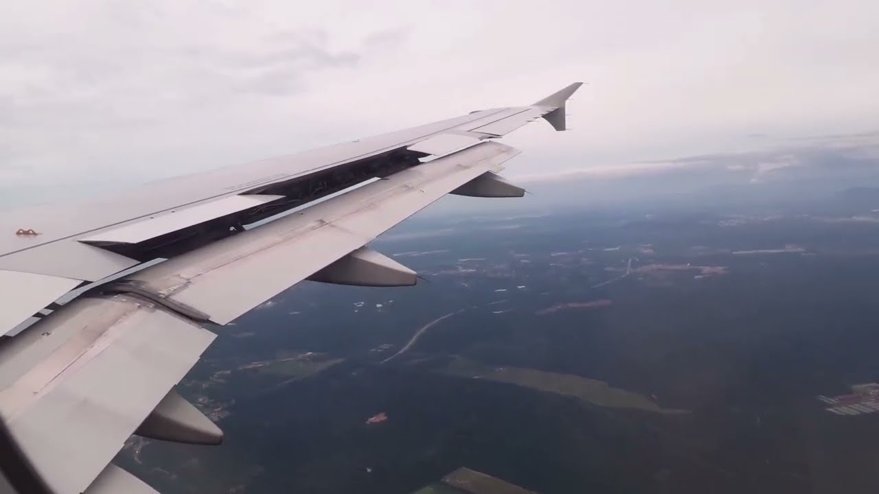 Airasia AK6115 PEN-KUL landing Runway 33