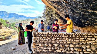 Nomadic lifestyle with mother cooking with Atish and building shelters with stones