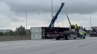 Scene Semi-truck tips over on I-80 in Omaha backs up traffic for hours