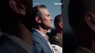 Pete Hegseth joins thousands at Navy vs Air Force game, sets pushup world record in one-minute feat.