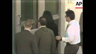 Michael Jackson Arriving At Court In Handcuffs