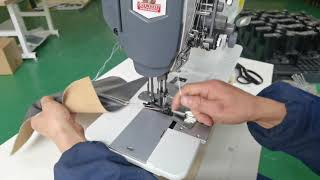 Heavy duty walking foot sewing machine with lap seam folder