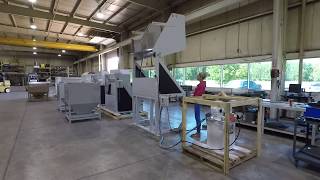 IMCS Container Dumper elevated on a stand...