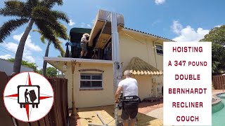 HOISTING A 347 POUND BERNHARDT RECLINER OVER A SECOND FLOOR BALCONY #sofahoisting #sofaoverbalcony by help2move 247 views 2 years ago 1 minute