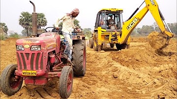 New Jcb 3dx Backhoe Loader Machine Loading Red Mud In Mahindra 265 DI Tractor | Jcb | Jcb Tractor