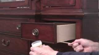 How do you lubricate a drawer with plastic runners?