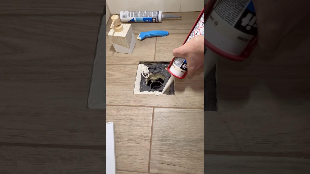 installing a drain grate using silicone 