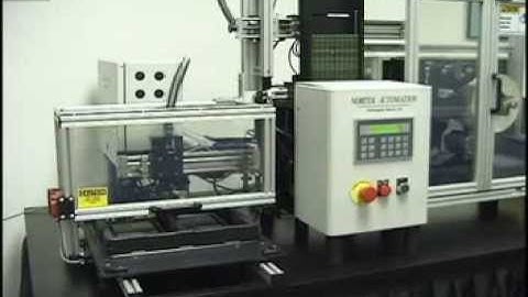 Print Apply Labeler with magazine feeder and tray loader NortekAutomation