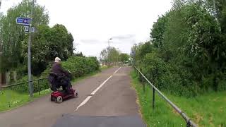 Idiot overtaker twice in two minutes and mobility scooter