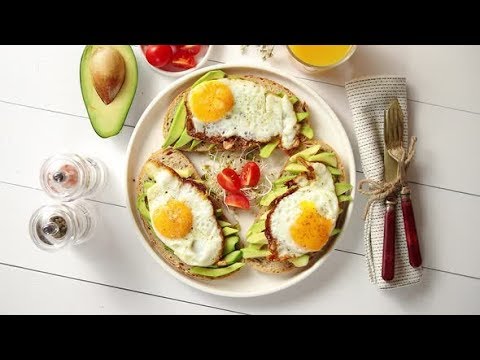 Delicious Healthy Breakfast with Sliced Avocado Sandwiches with Fried Egg | Stock Footage -