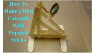 How To Make a Mini Catapult With Popsicle Sticks kids toy easy make at home step by step.