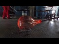 Glass blowing a large organic orb light shade - Ngwenya Glass