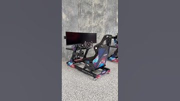 Two custom Ford racing sims we built for a recent event, featuring Simagic gear and custom graphics!