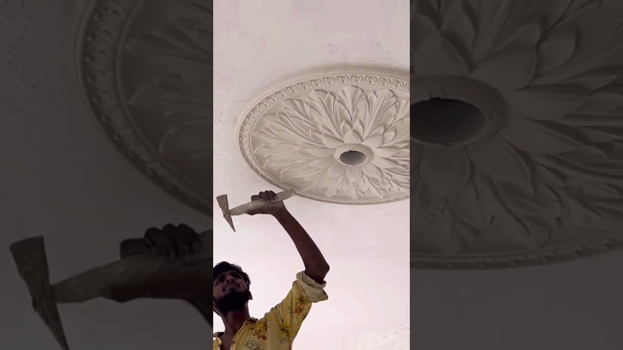 How well these workers know how to easily install gypsum plaster for ceiling medallion fans.