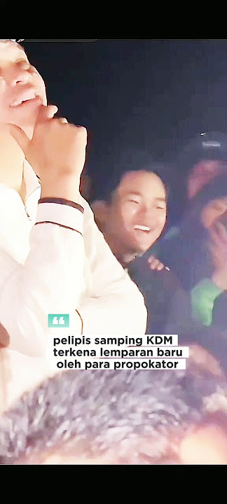 KDM continued to joke with the demonstrators even though he was hit by stones thrown by the provo...