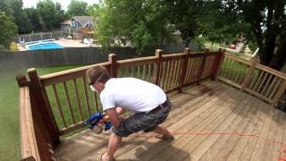 A homeowner compares rolling, brushing & spraying stain on his deck.