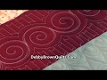 Layered quilting in a border starting with a stencil