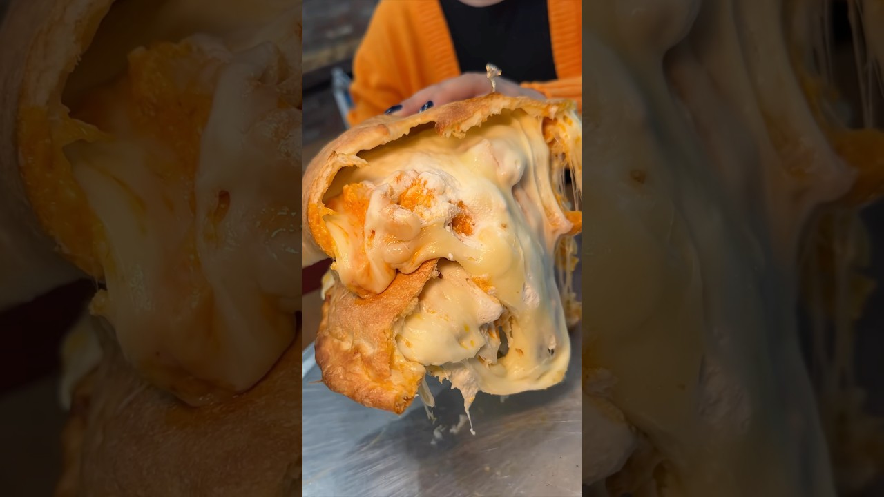 The WILDLY CHEESY BUFFALO CHICKEN CALZONE from Nuovo York Pizza is 🔥🔥!! #DEVOURPOWER
