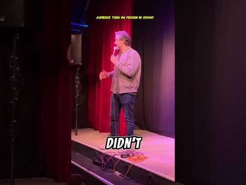 CROWD TURN ON AUDIENCE MEMBER