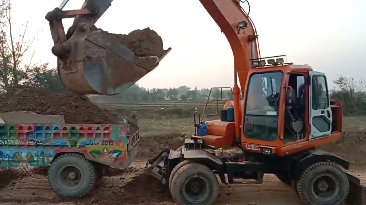 Dossan 5  160 Excavator Amazing work    Loading a trolley’s 