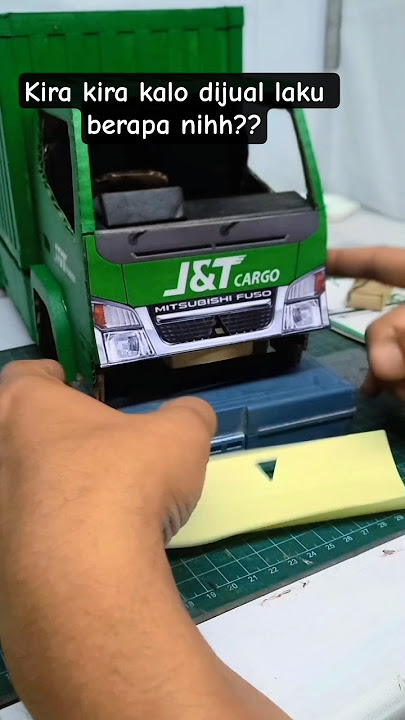 miniature J&T cargo truck made of cardboard
