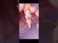 Soft pink 3D floral nails with chic black outline.#FloralNails #PinkNails #3DNailArt #ElegantNails