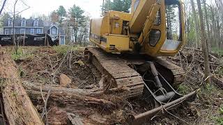Cleaning out a culvert ditch in the 190e