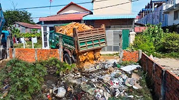 Massive Flooded Landfill Delete Garbage Area Using Bulldozer Push soil with 5ton Trucks