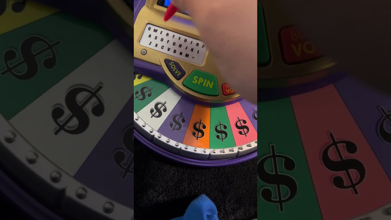 Wheel of fortune 2009 electronic game 1