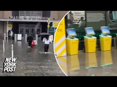 Wild videos show flooded LaGuardia Airport terminal, travelers attempting to flee ankle-deep waters