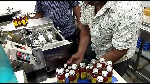 SEMI AUTOMATIC WET GLUE LABELING MACHINE WITH SENSOR BASE UNIT