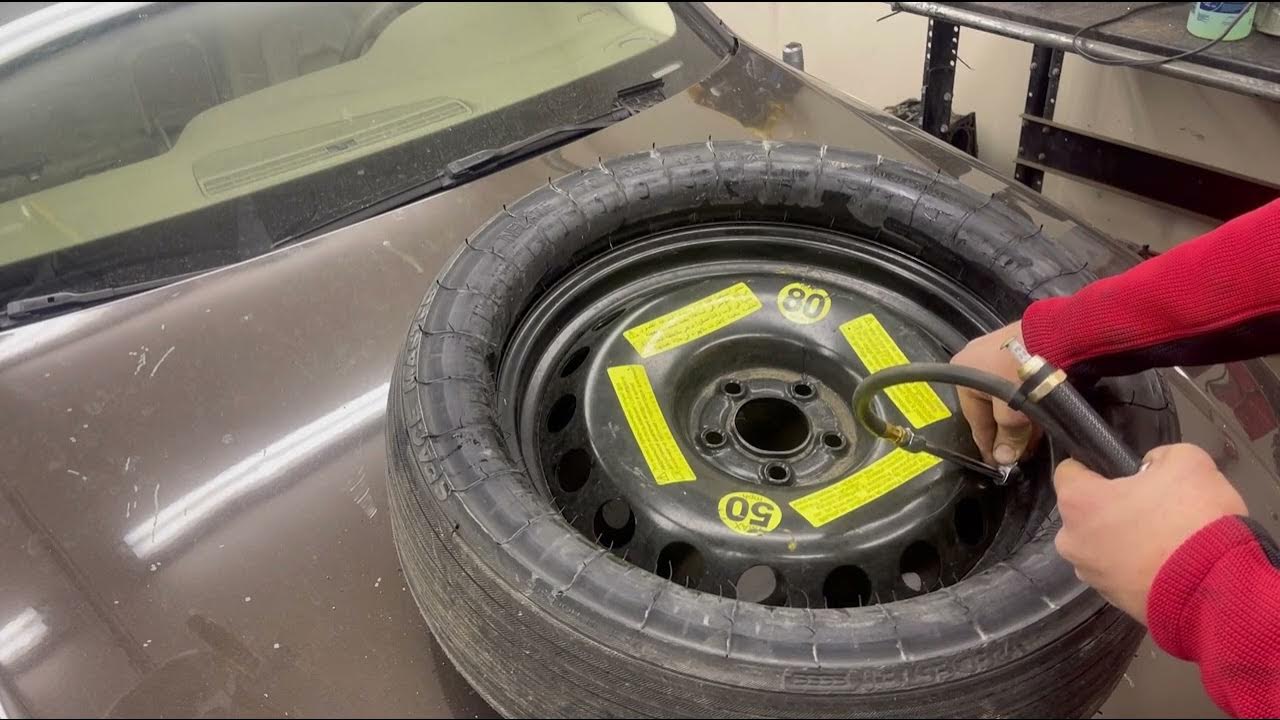 Weird offset Audi Spare Tire Q5 Q7 space saver inflation instructions