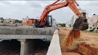 Tata Hitachi 210 Nala ka Pani clean ho Raha hai barish ful hua