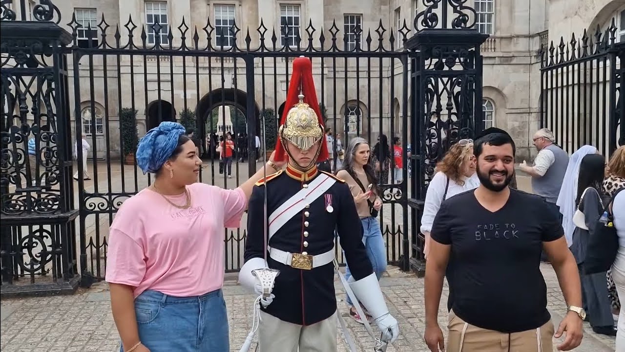 Tourist touches the plume on the back of the kings guard head and gets a close shave #thekingsguard